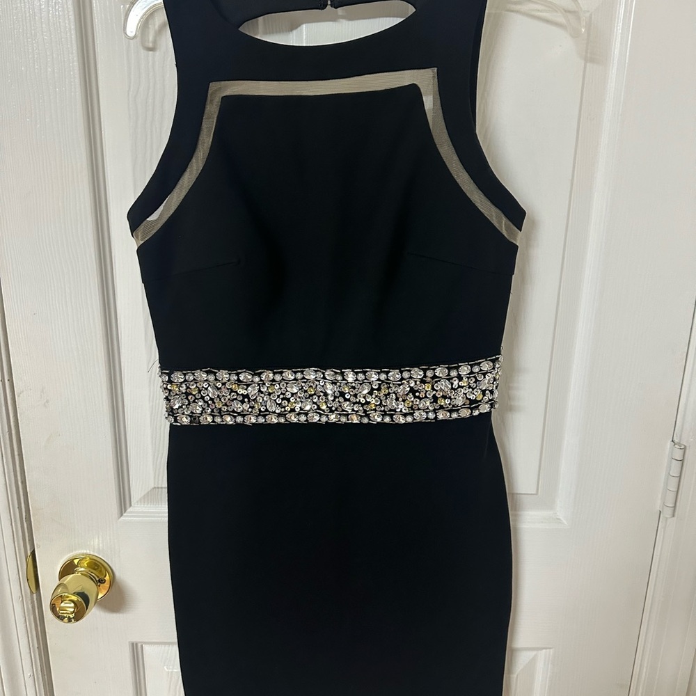Elegant Black Dress with Embellished Waist